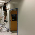 Painting the base coat for the mural